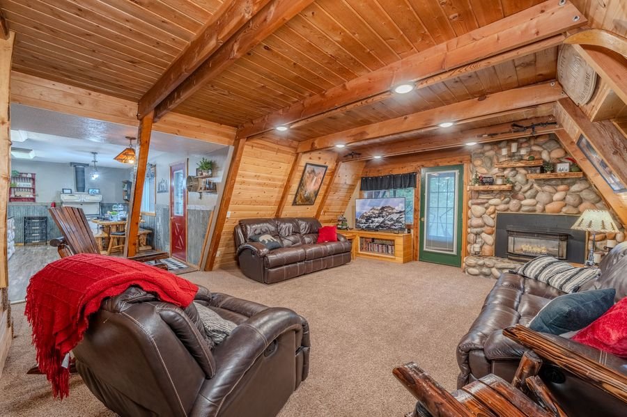 Great room — leather recliners and log rocker