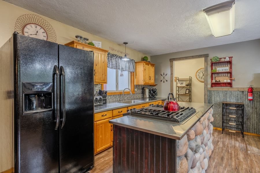 Kitchen with red door and dining area