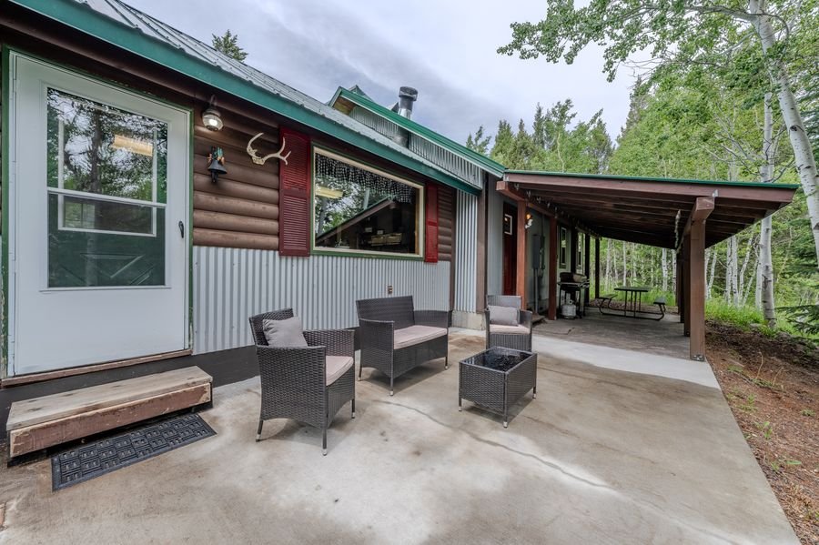Covered back patio with seating